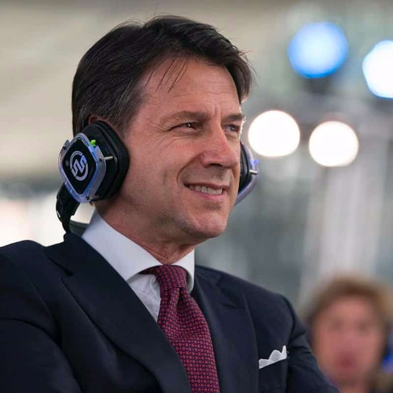 Giuseppe Conte – Silentsystem Giuseppe Conte mit Silentsystem-Kopfhörern bei einem Event